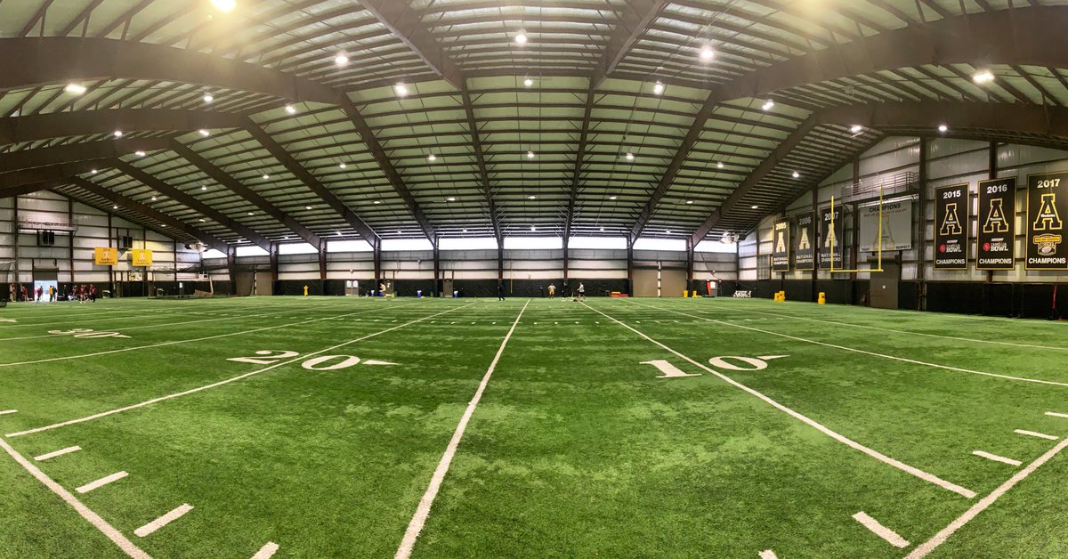 Raining in Boone, so @TroyTrojansBSB is utilizing the App State FB Indoor facility to get work in!!