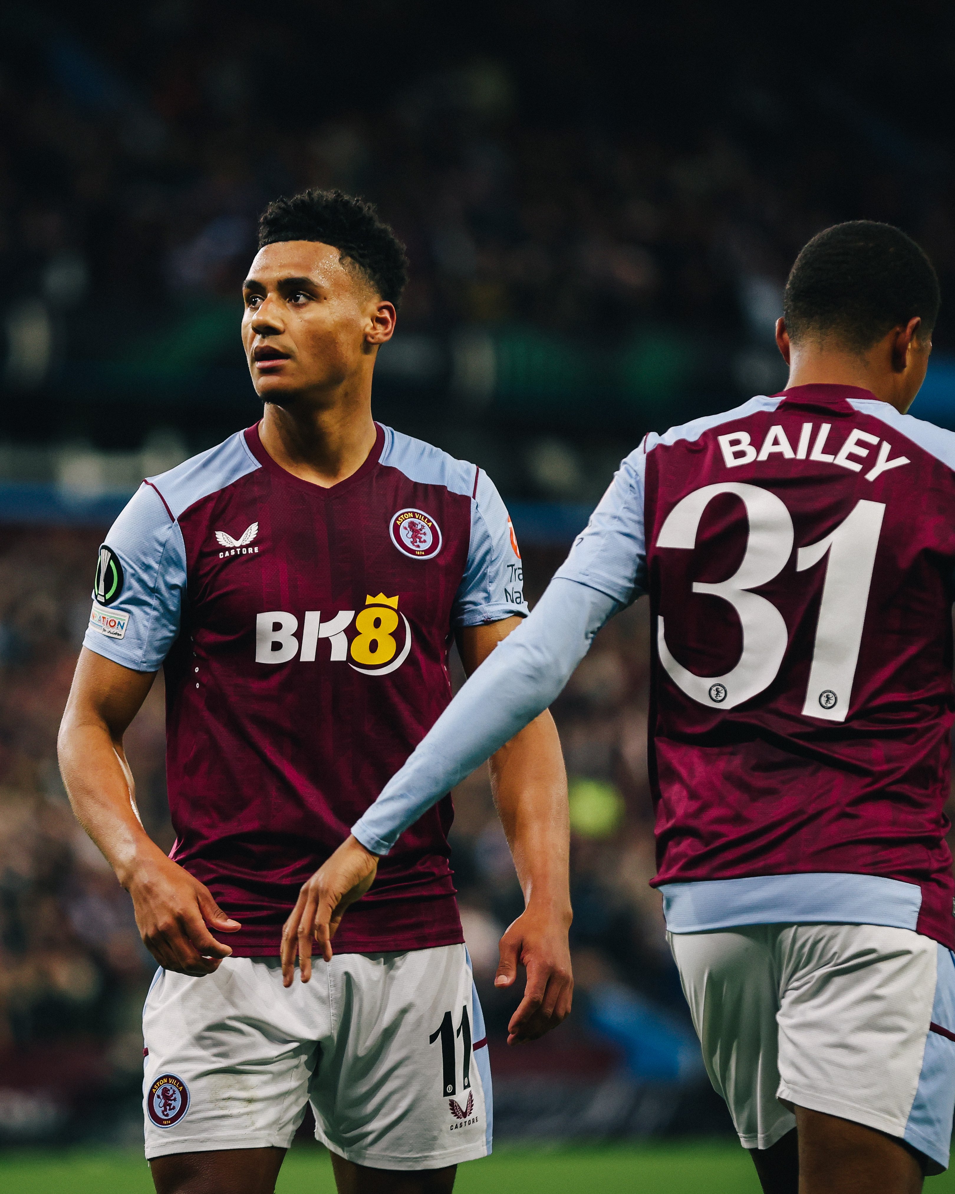 Ollie Watkins and Leon Bailey in action.