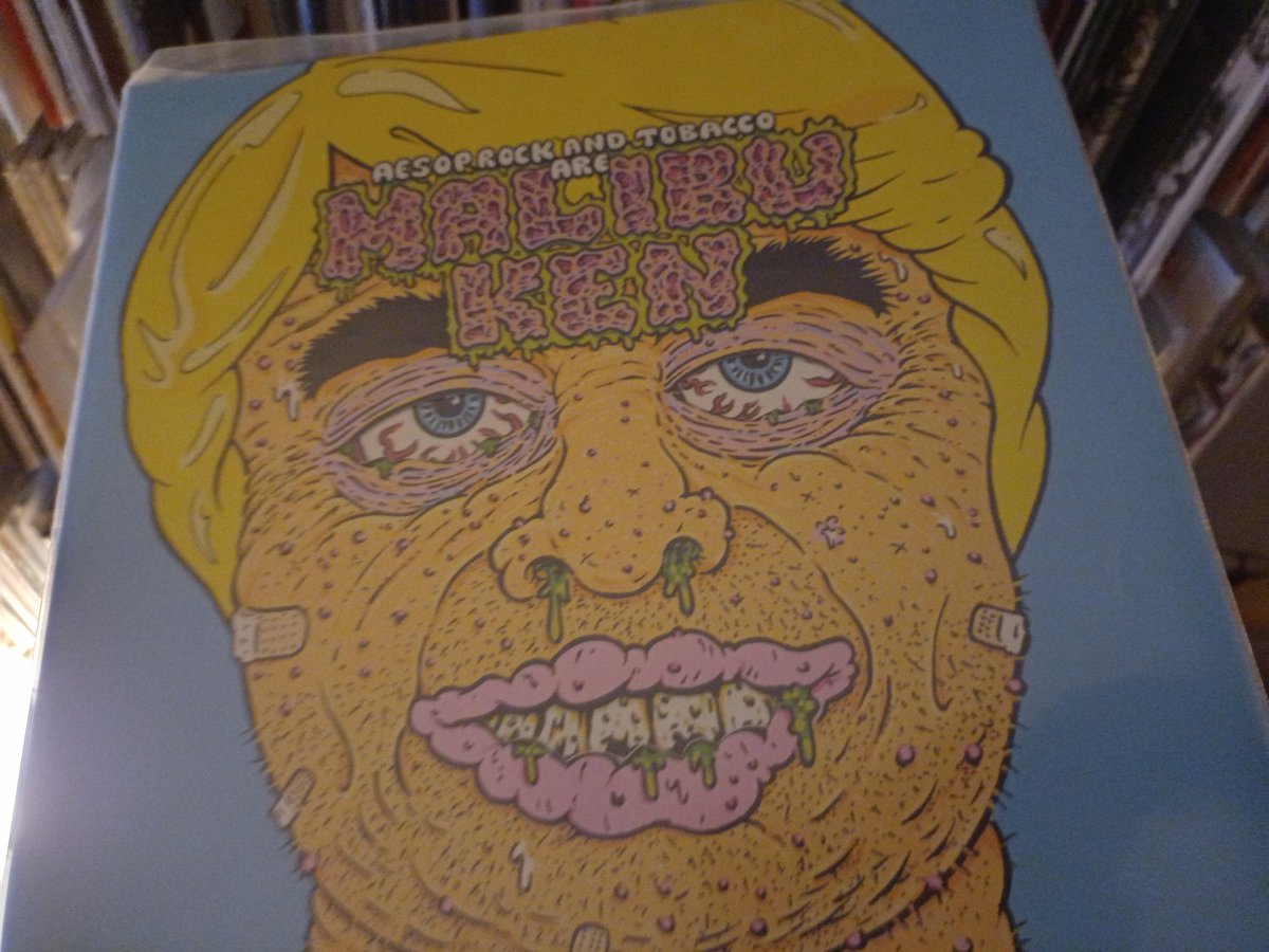 One of the best records of the last few years, Malibu Ken by Aesop Rock + Tobacco. I'd argue this is Aesop Rock's best record, Tobaccos production is so perfect. Anyhow, I noticed it's cheap as hell at Juno - juno.co.uk/products/aesop… - you even get a mask. Go grab it.