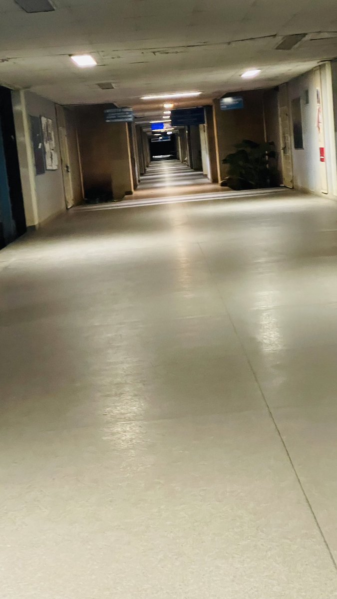 YunisHusseinMD's tweet photo. This is me walking alone in KNH Corridors at 3:15am on 6th August 2023. I have about 500 of such photos of corridor photos just show how crazy the hours are… I call them corridors chronicles and put them on my WhatsApp status for fun #DrStrikeKE https://t.co/rnnkB0BJ5u