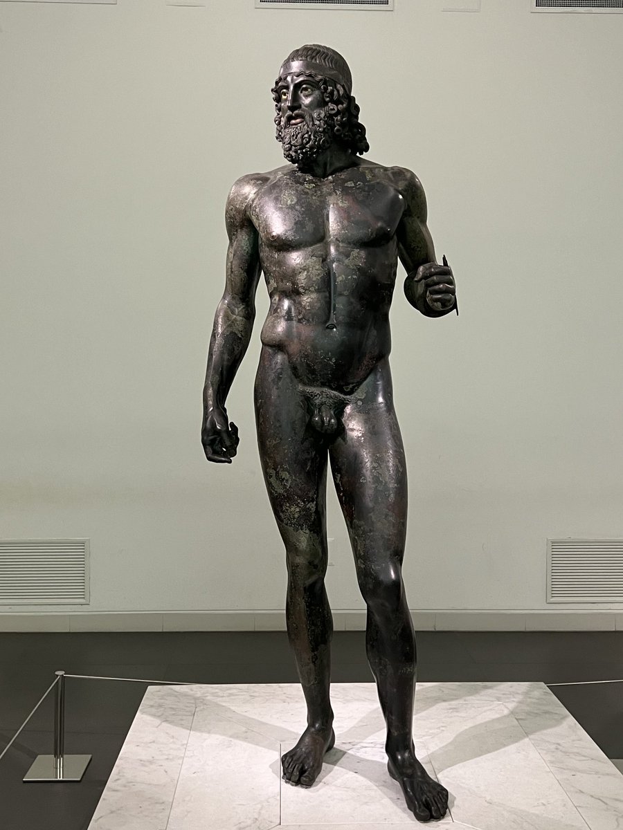 Looking on in amazement at one of the two Riace bronzes  dating 5th century BC discovered in the sea by fisherman in 1972. Exquisite examples of #Greek #sculpture possibly associated with #Phidias and #Polyclitus. #ArcheologicalMuseum #ReggioCalabria #Italy #art