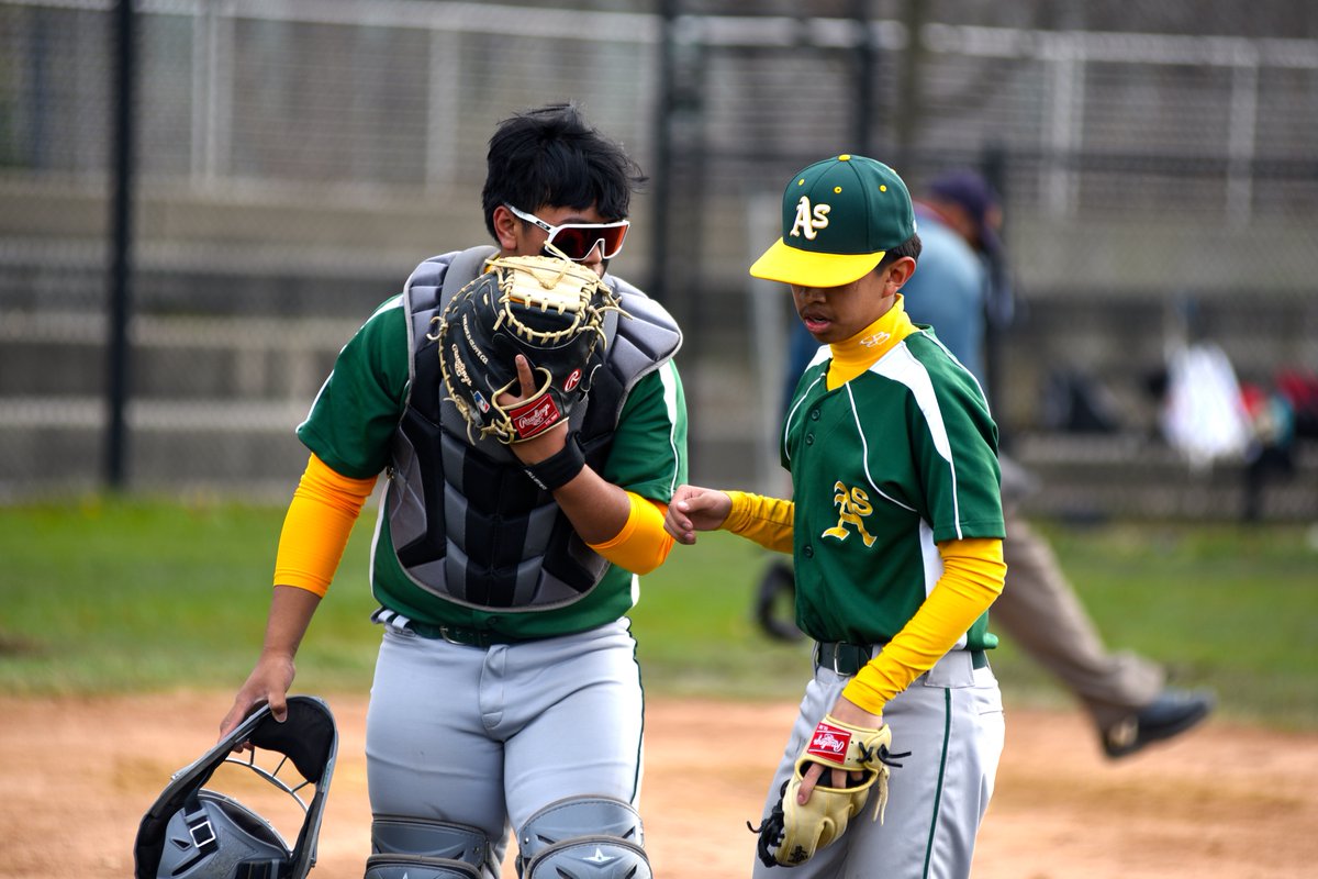 'Psst...Isaac. I think our uniforms are pretty killer. What do you think?' -- Ag Science junior catcher Elias Fernandez (probably) beverlyreview.net/sports/