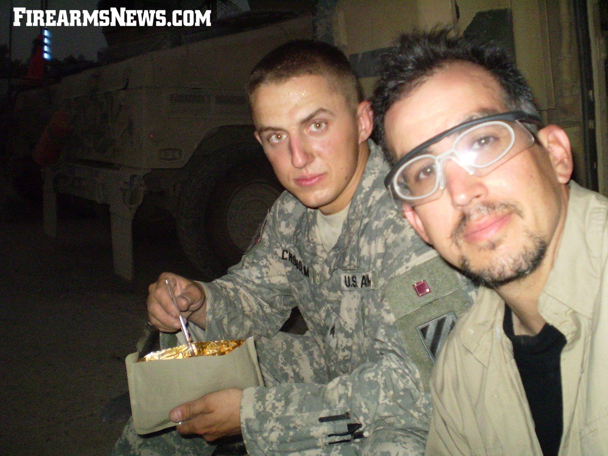 A Feast!! Firearms News Magazine Executive Editor David Fortier (right) and SSG Dustin Chisholm (3/7th Cav) enjoy an MRE feast July 17th 2007 in Adhamiya, Iraq. The hungrier you are, the better the food tastes...remember??