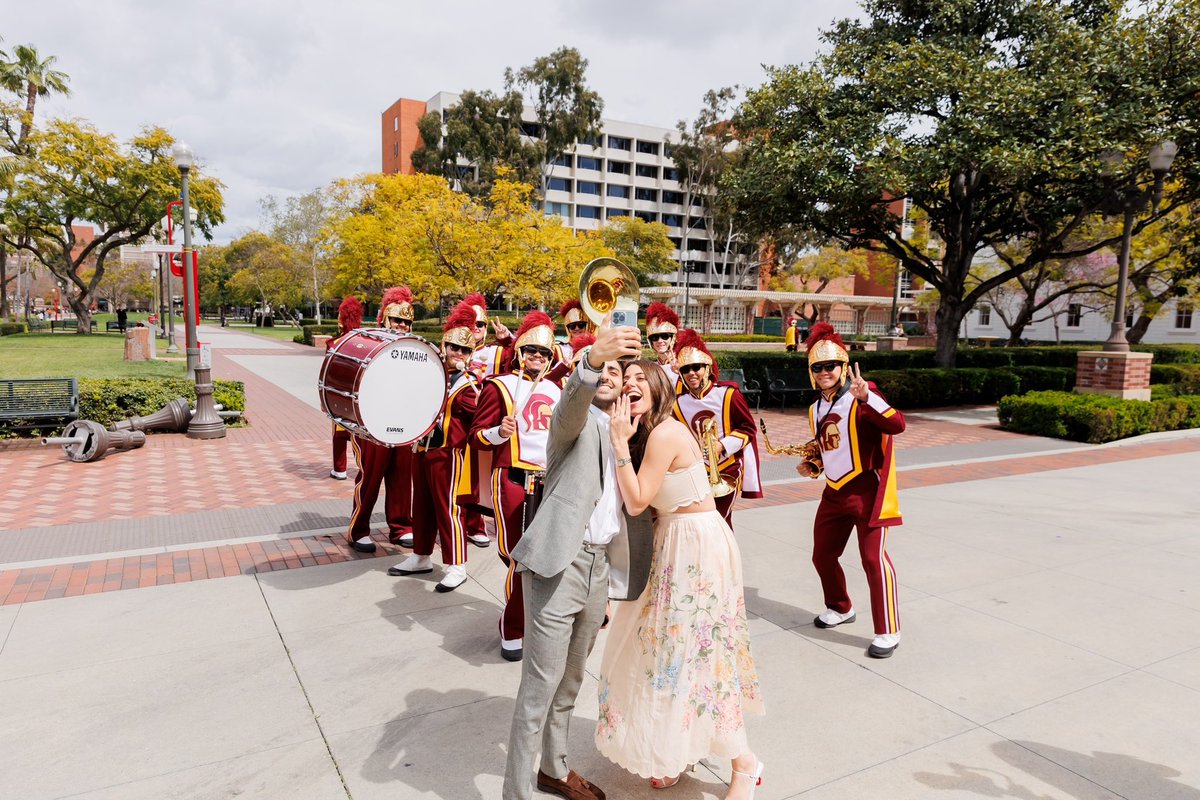 Proposing at a basketball game on the Jumbotron. ❌ Proposing on campus to your double Trojan girlfriend with the band. ✅ Congratulations to David and Camille! 📷: Walt / Modern America Studios