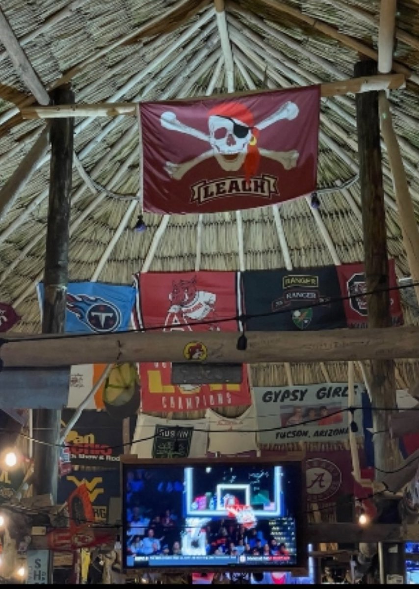 Look at these Texas Tech & Mike Leach flags! Of all places, they are up at a restaurant called Palapa in San Pedro, Belize! Wow! So cool!