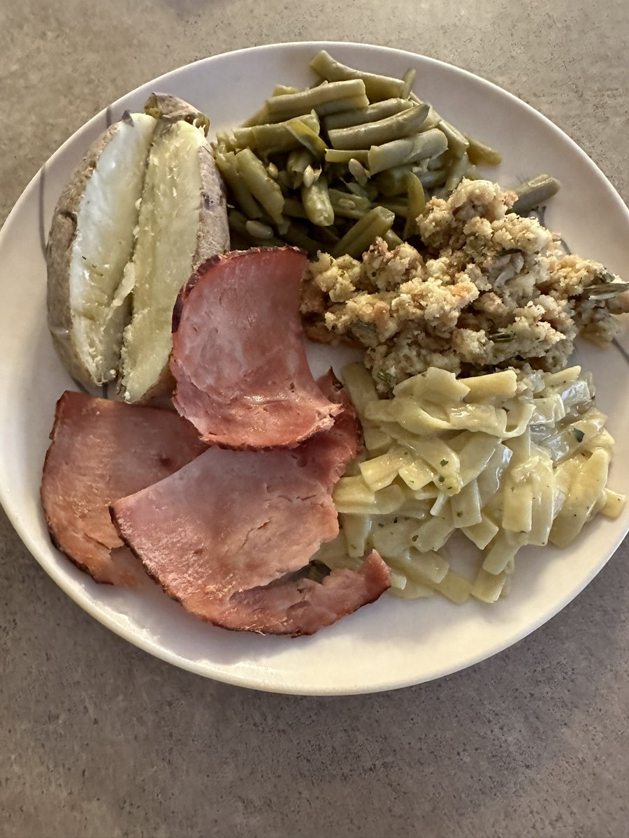 Well supper is on the table who is hungry ??? Honey baked ham, baked potato, green beans, creamy chicken noodles and stuffing. Got a lemon filled bundt cake in the oven.