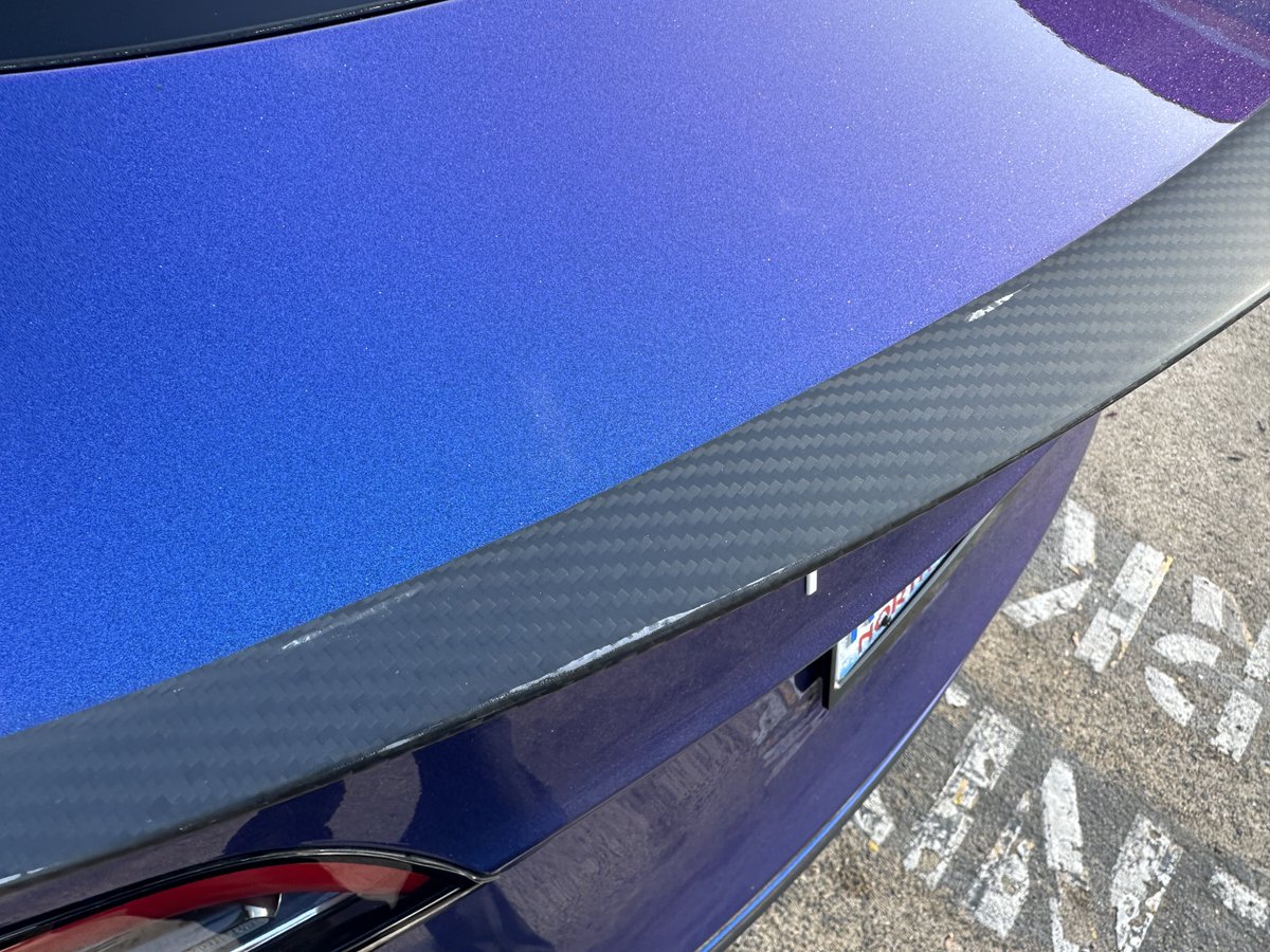 Looks like the coating on the @evbase_official spoiler on my Model Y is failing even with mostly indoor parking in less than a year