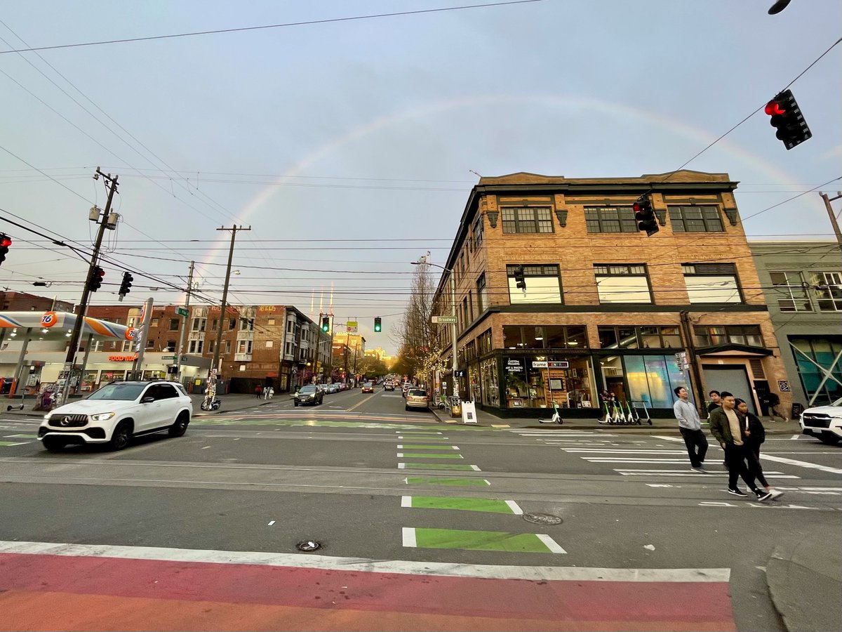 Sometimes the world smiles at you & lets you know that the future is going to be good. Rainbows always make me smile, even more when riding new protected bike infrastructure like on Pike Street on my way home this evening #SEAbikes