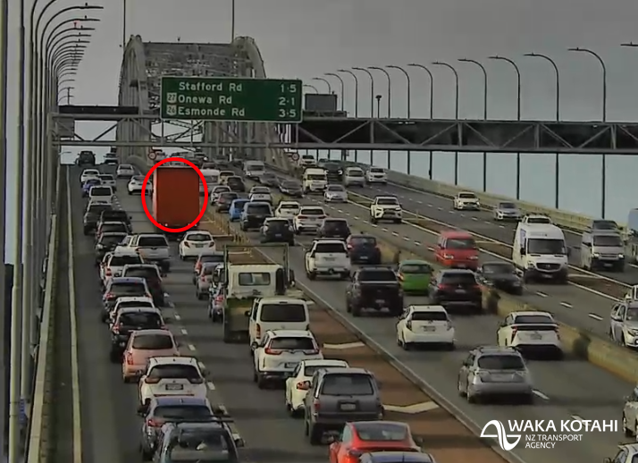 SH1 AKL HBR BRIDGE - 3:40PM A breakdown is blocking the left northbound lane (lane 2 of 4) on the Harbour Bridge. Merge with care to pass and expect delays. ^HJ