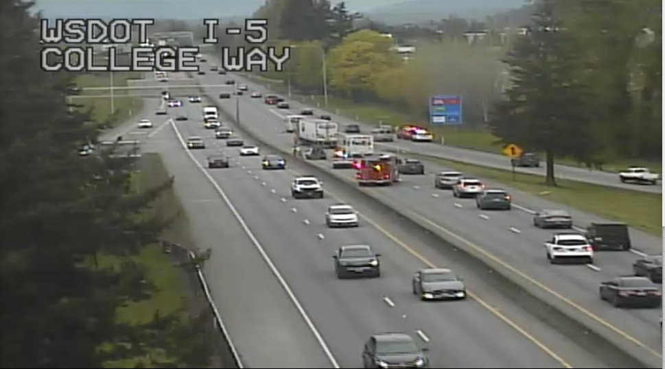 UPDATE: Now only the left lane on NB I-5 at College Way in #MountVernon is blocked for a collision. 

Expect delays in the area.