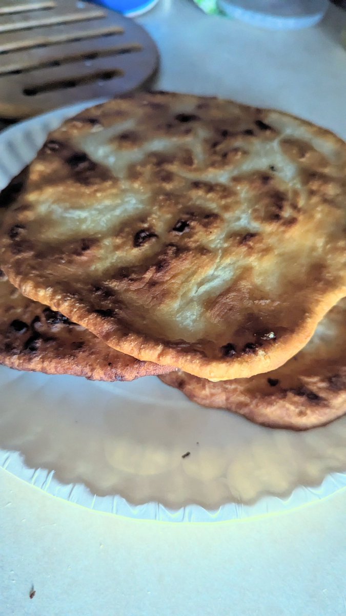 aquatixwitch's tweet image. I burnt it a teensy bit, but Kiddo didn't seem to notice, they've already horked down three pieces. XD #frybread