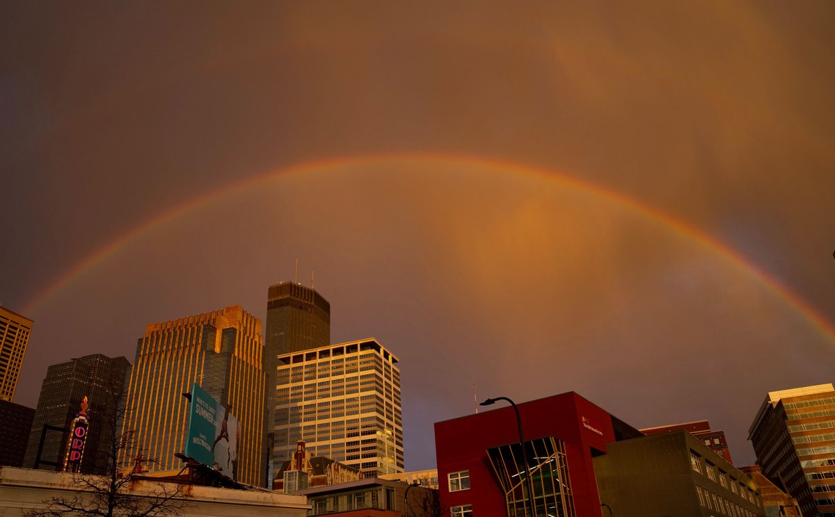 Somewhere, under the double rainbow, downtown Minneapolis was full of color, in these images from photographer @KormannAlex on Thursday night.