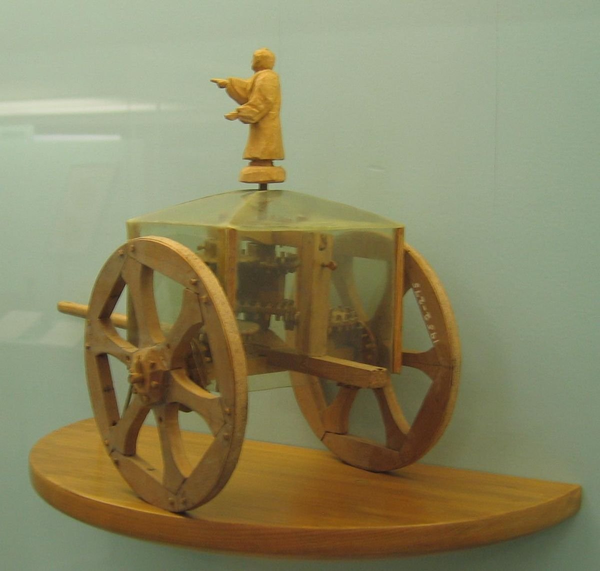 The ancient Chinese invented a 'South-pointing chariot' containing a complex gear system that would maintain a figure mounted on it always pointing in a certain direction (i.e. south) to assist in land travel.