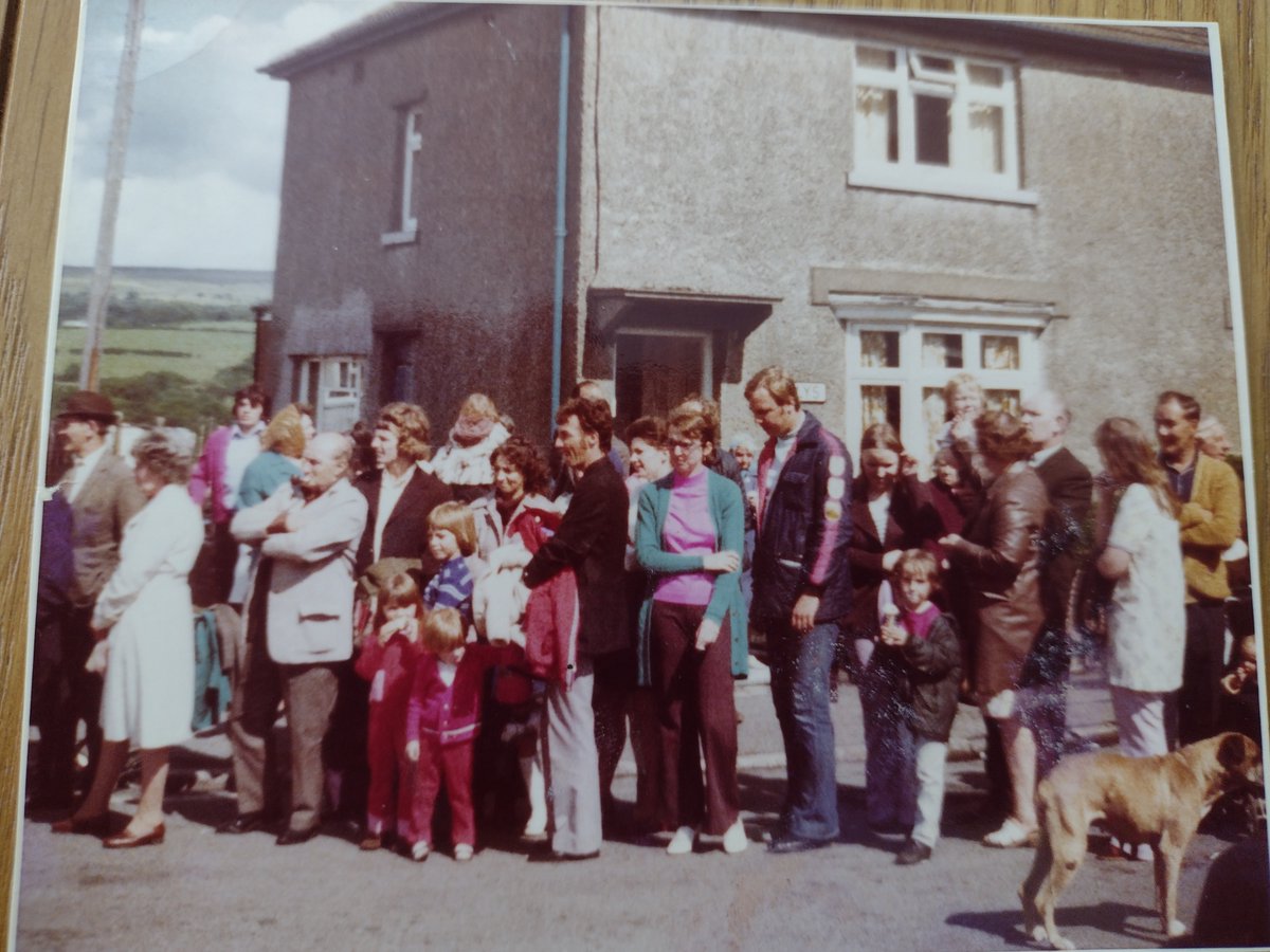 1974ish. Welsh VaIIeys. Waiting for the carnival parade and jazz bands. It was quite a big thing on our estate in the early 70s. Also the random, let loose dog. The place was full of dogs that even formed packs... there's been a real culture change for the better with that. 🙂