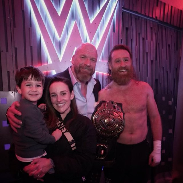 Sami Zayn backstage, at Wrestlemania, with his family and Triple H