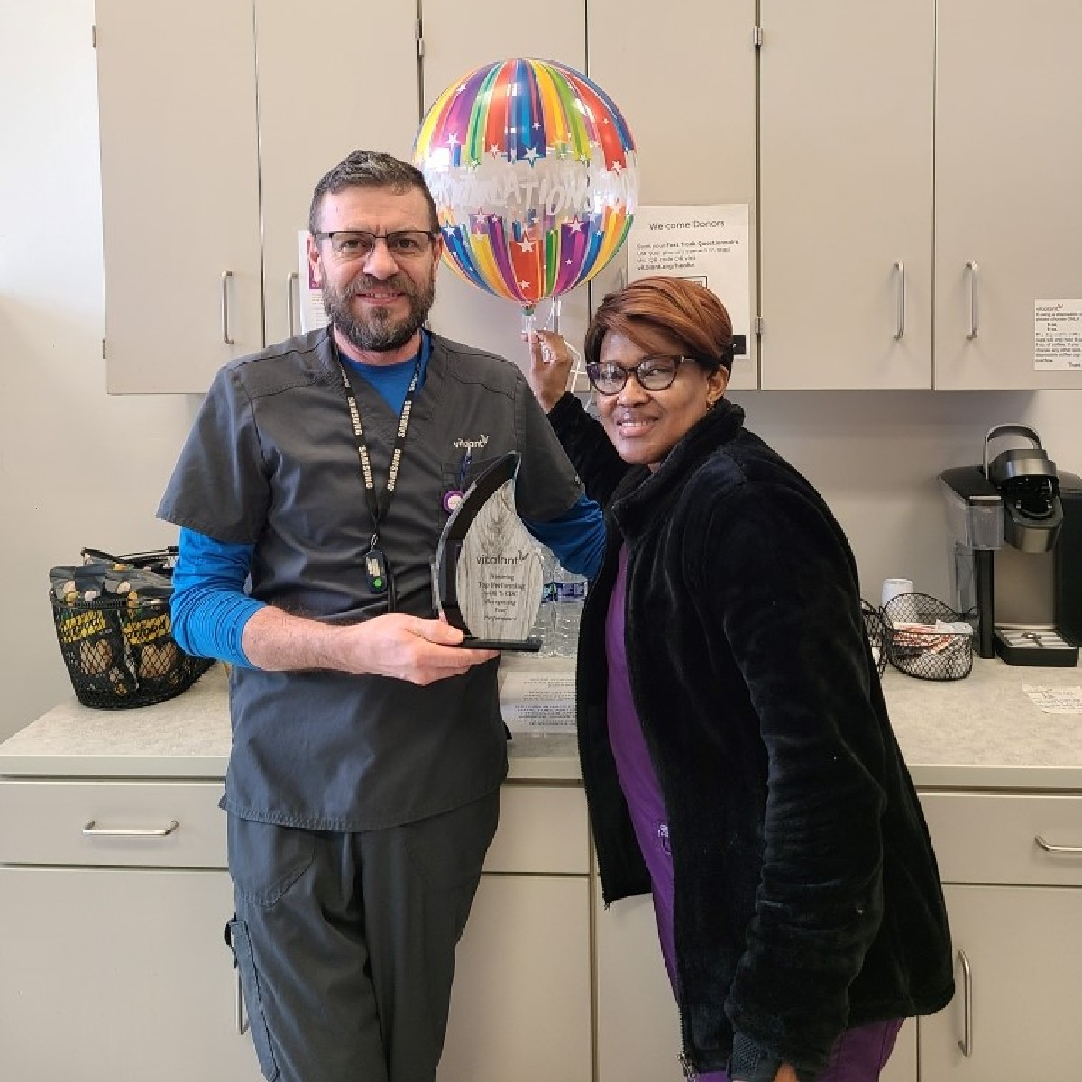 Three cheers to Dan and Dioula at our Evanston donation center! The Evanston team is proudly displaying our traveling trophy for donor education! Educating our valuable donors about what type of blood product is needed and why is vital to our mission to save lives!