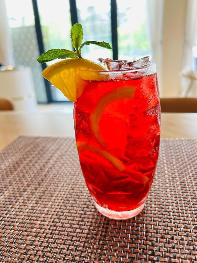 Refresh yourself with the floral elegance of hibiscus iced tea 🍹, a perfect complement to fine dining at Cultura Mombasa - #WorldCuisine now open for lunch and dinner 🍽️✨🍷! #Reservation required on +254 711 118 112 #FineDining #Culinarydelight #foodiehaven #mombasarestaurant