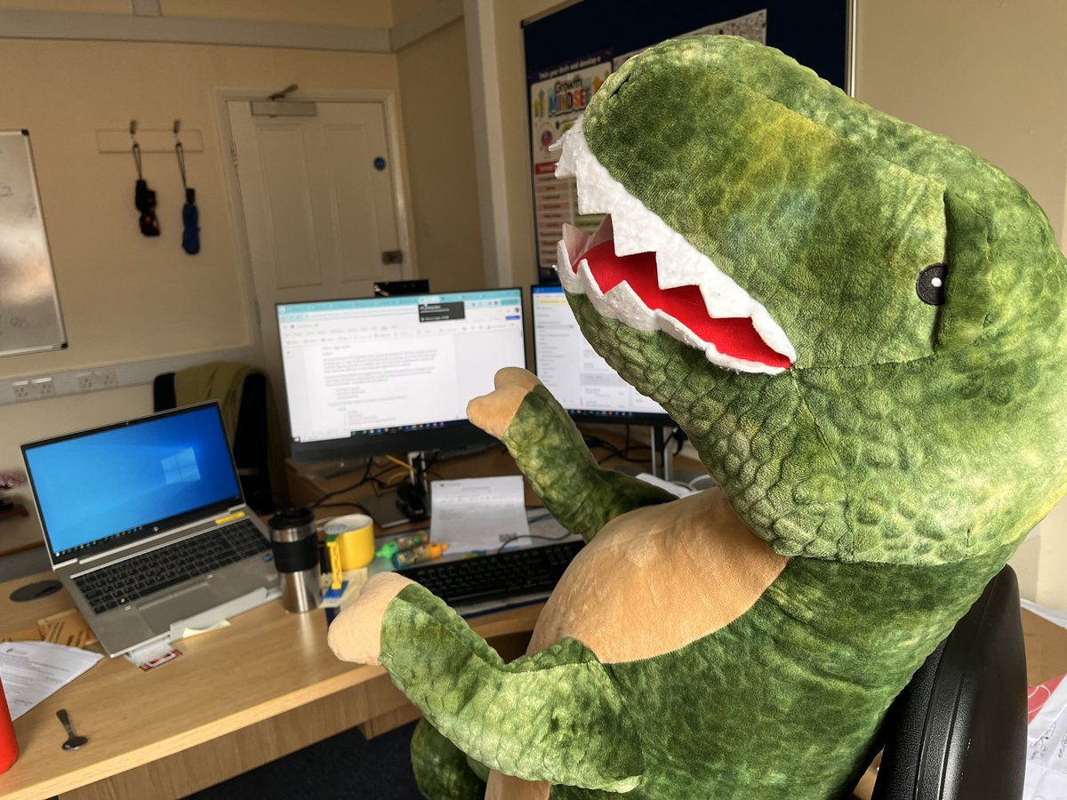 Sitting like a scholar in my office.