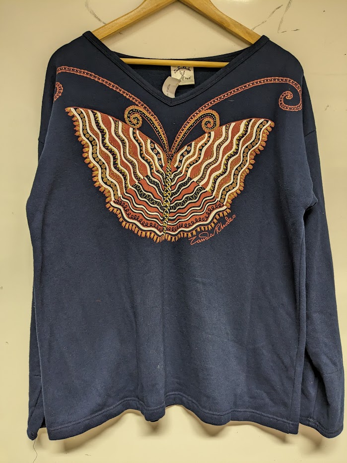 With many of Dame @Zandra_Rhodes designs inspired by nature we're spoilt for choice for #archiveanimals for #Archive30 But we really love this peacock feather fabric & butterfly top for People tree. @librarydmu @ARAScot @explorearchives @AStitchinTime13 @dmufashion @DMUTextiles