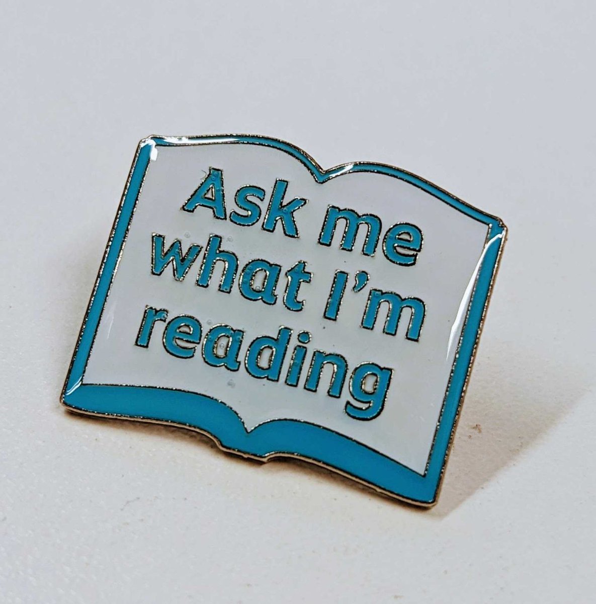 One of our favourite questions. . . What would your answer be?🤔 Shop our pin badges now! 👉 shop.scottishbooktrust.com/products/ask-m…