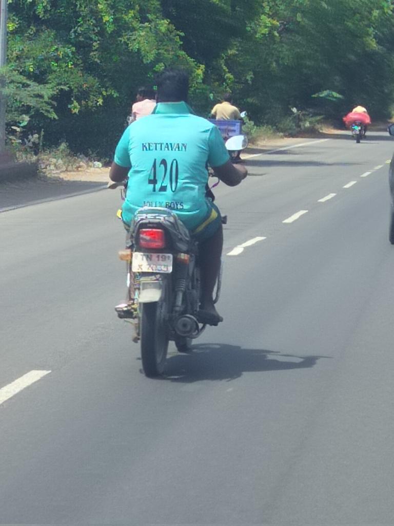 Slogans on TSHIRT Kettavan 420 Jolly boys This lad just came right near the left fender of our car. My friend anticipated this and braked and told me to read his t-shirt 😜 #RoadSafety