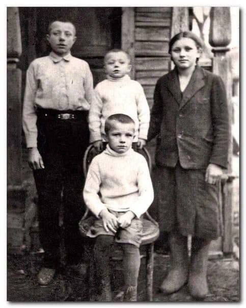 The youngest boy on this picture is little Boris, the Germans will hang him on a scarf but his relatives will be able to save him at the very last moment. After the war, he will work at a radio lamp factory. The two elders (on the right and on the left) will be driven away by…