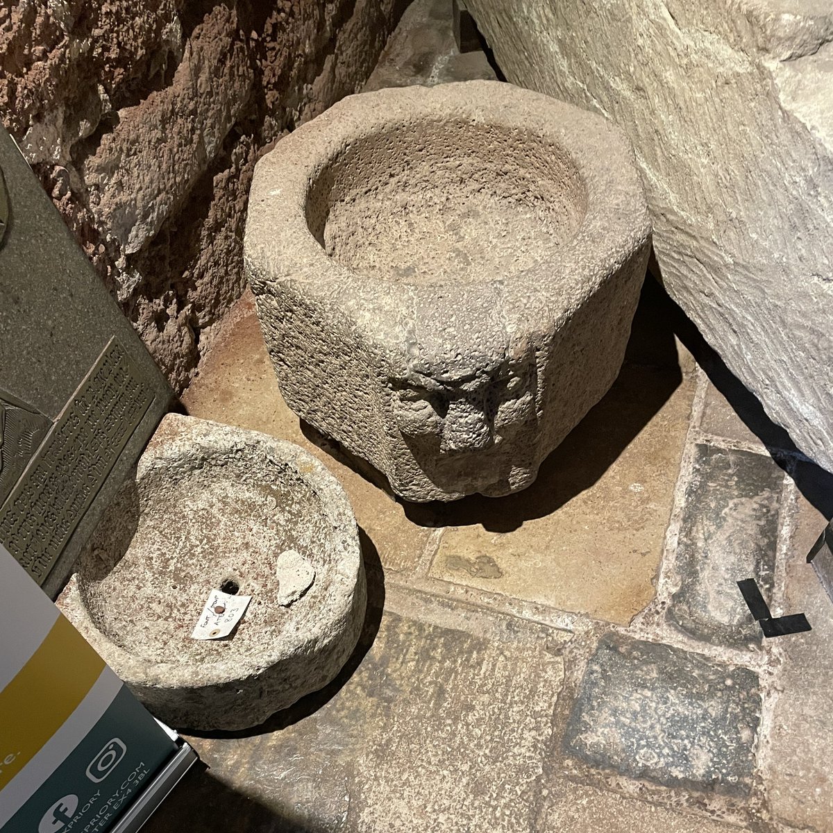 When is a font not a font? When it’s a stoup? (The label says font/stoup.) A collection of ancient stonework at St Nicholas Priory, Exeter. #fontsonfriday