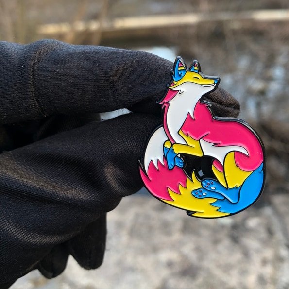 Our #Pansexual Wolf Enamel Pin dances with joy and spreads love and acceptance wherever they roam!