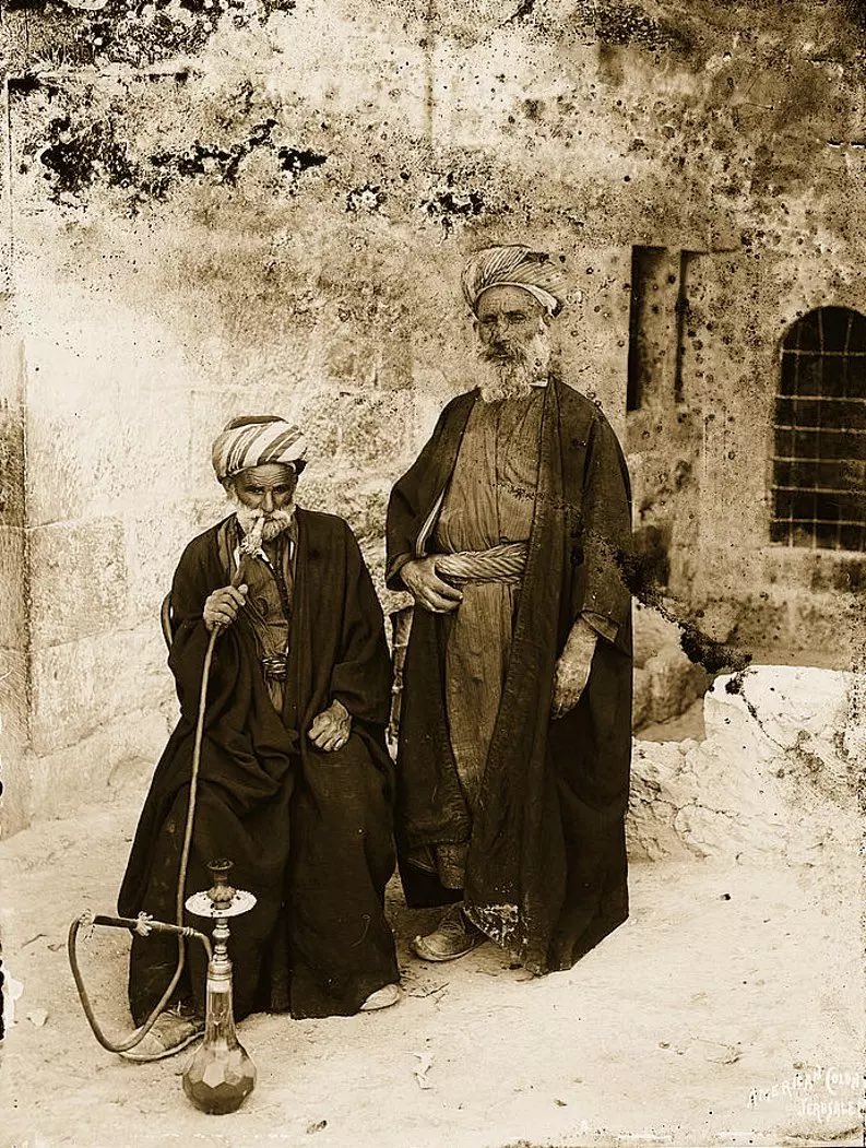 Two men in the city of Bethlehem, Palestine, around the year 1890.