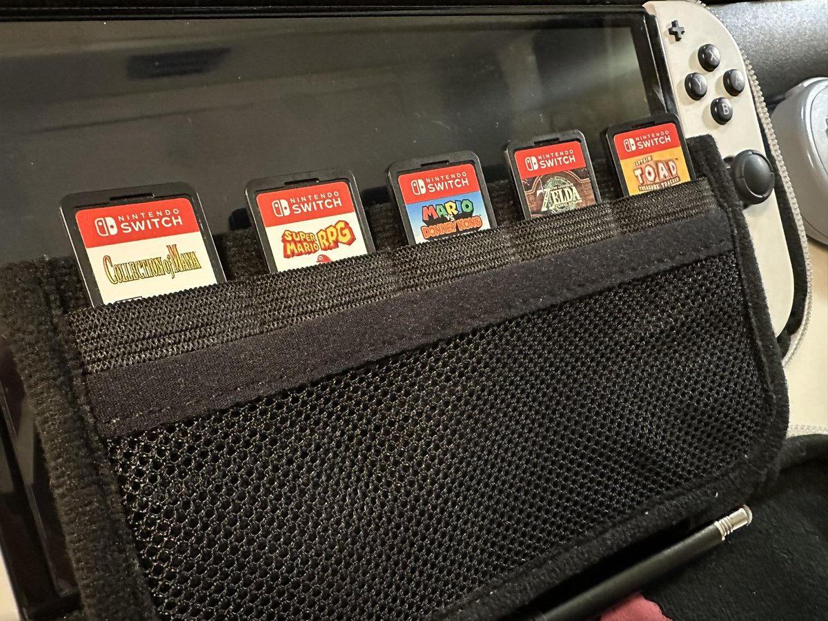 My Switch carrying case holds 5 extra cartridges. These are in constant rotation. I always have Zelda on hand, just in case. What games are currently in your carrying case?