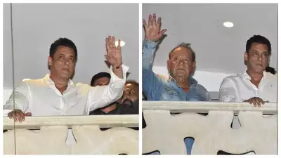🌟🌙 Eid festivities with a touch of family love! Salim Khan joins son Salman Khan as they greet fans from the balcony of Galaxy apartment. 🕌💫 Sending Eid wishes to all! #SalmanKhan #EidGreetings #GalaxyApartment #FamilyCelebration #EidMubarak #Bollywood #CelebrityLife 🎉🌟