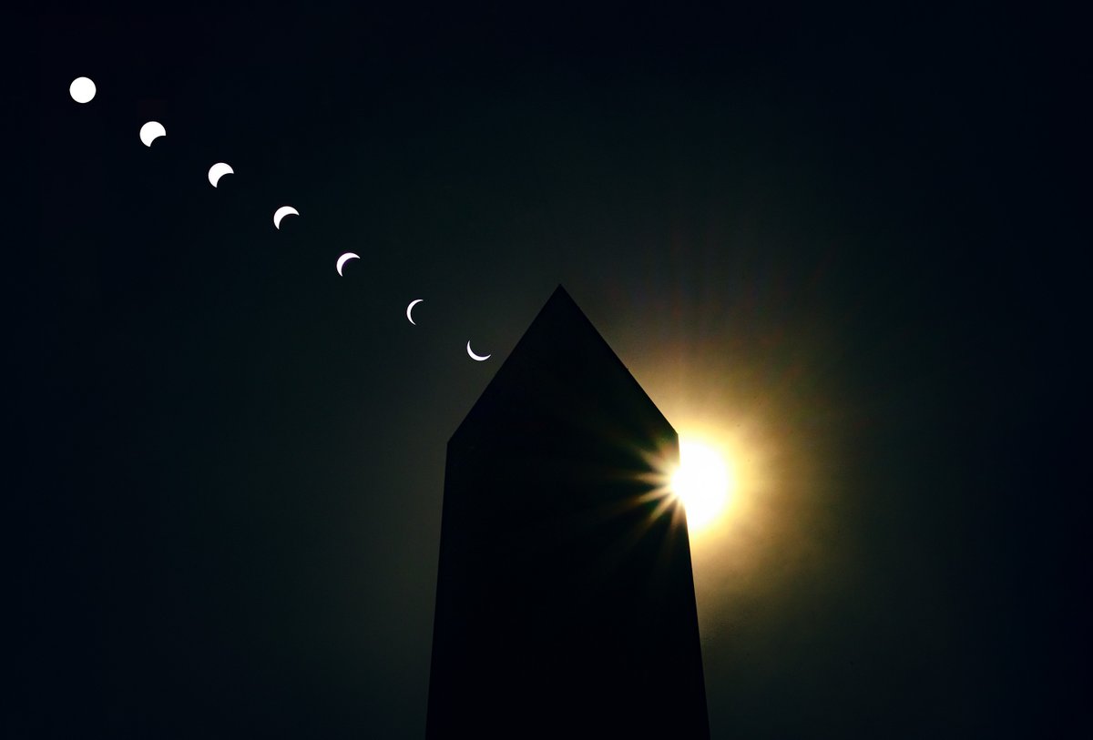Another representation of the solar eclipse over D.C. Seven photos were shot with a solar filter and one without.