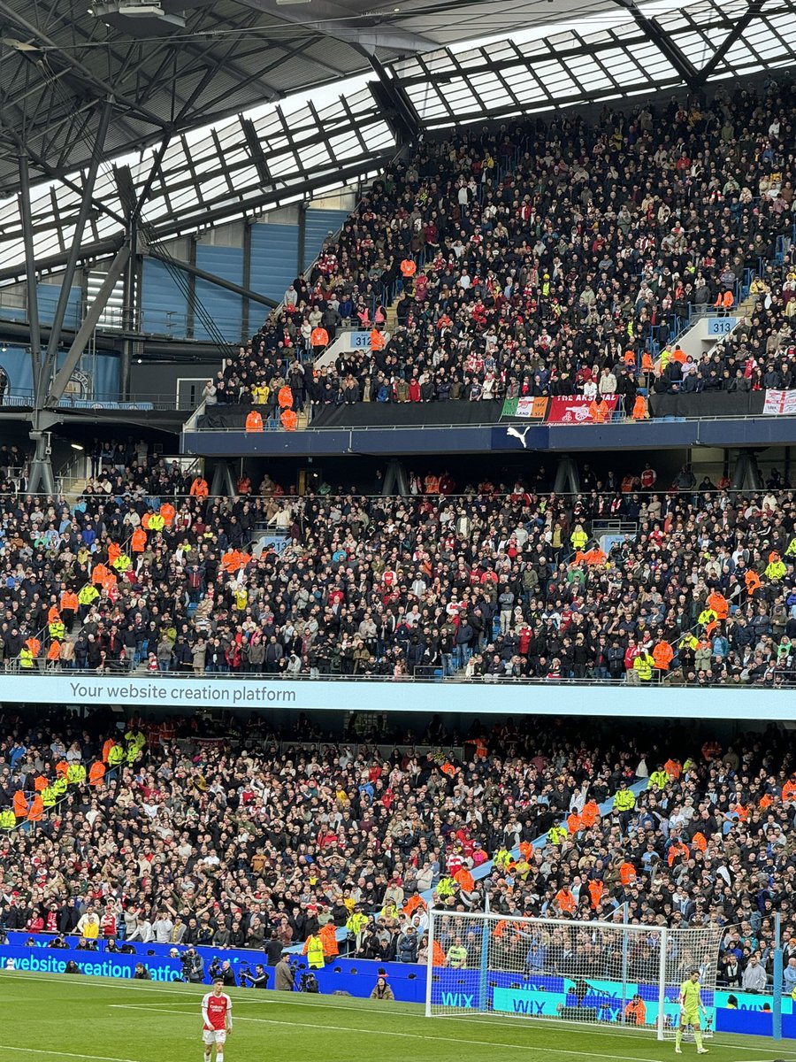 The tremendous travelling Gooners here at Manchester City making all the noise right now