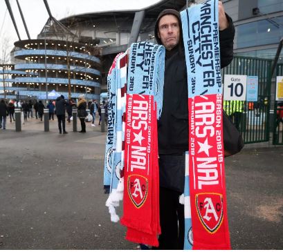 #ManCityvArsenal 

Q: What sort of fan buys/wears one of these?

I'll start..........a cunt