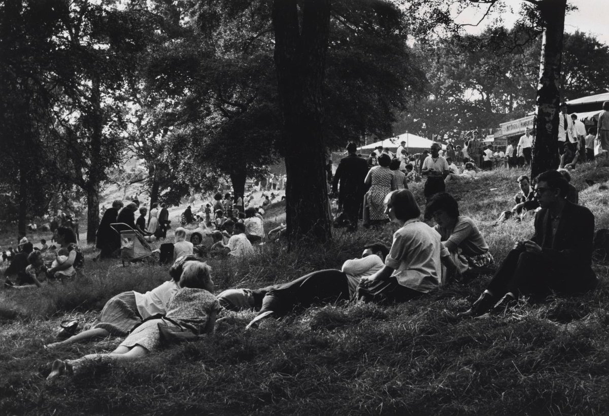 An idyllic #EasterWeekend in London captured 60 years ago by Wolfgang Suschitzky. 💭📷 Wolfgang Suschitzky, Easter Fair, Hampstead Heath 1964. bit.ly/3m9hCJo