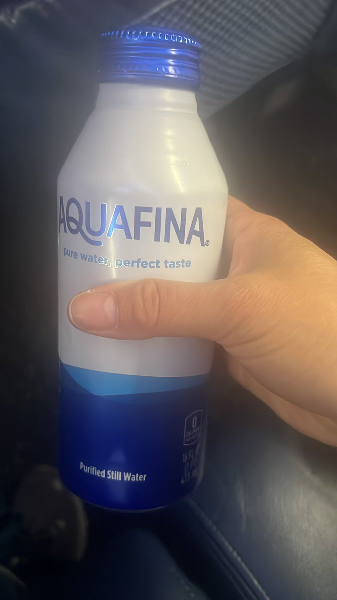 hsuder's tweet photo. @Aquafina your cans are impossible to open - your leaving a mom with 2 kids thirsty on a plane cause I can’t get the cap open on both bottles https://t.co/BykwbNsGHv