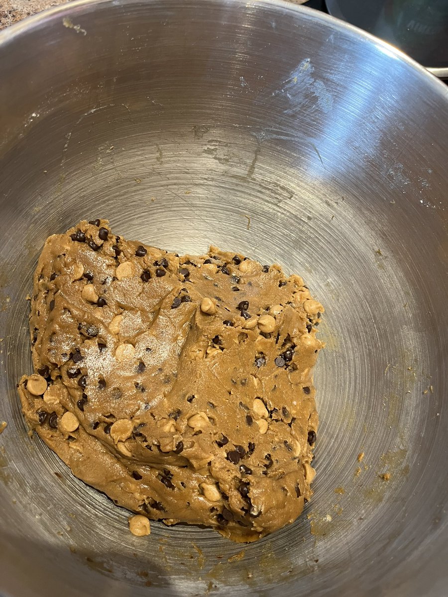 Fajita's tweet photo. Birthday cookies as requested. My son decided on the peanut butter chips and mini chocolates, great combo. Was fun making them together. https://t.co/uYGdh8Fask
