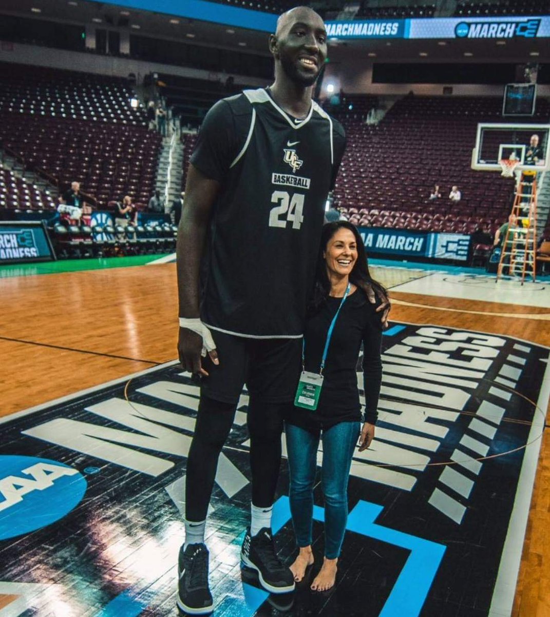 7 foot 6 Tacko Fall with 5 foot 2 Tracy Wolfson.