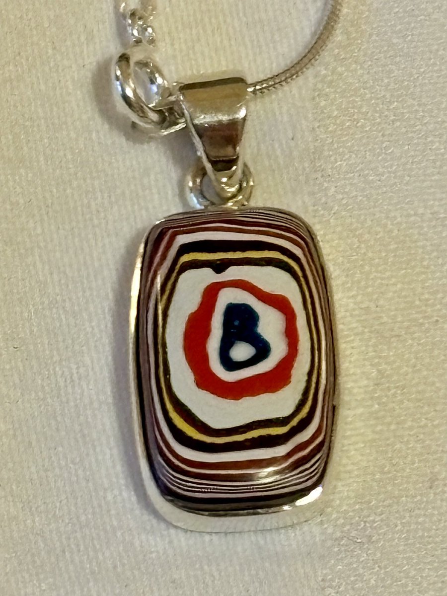 Early birthday present. I have to say that until today I had never heard of Fordite. Apparently it’s a byproduct of the automotive industry, layers and layers of over-sprayed car paint that have cured together to form a rock hard substance.