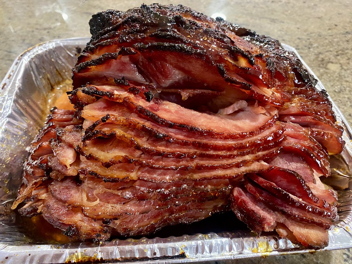 Name two sides that go well with honey glazed spiral ham.