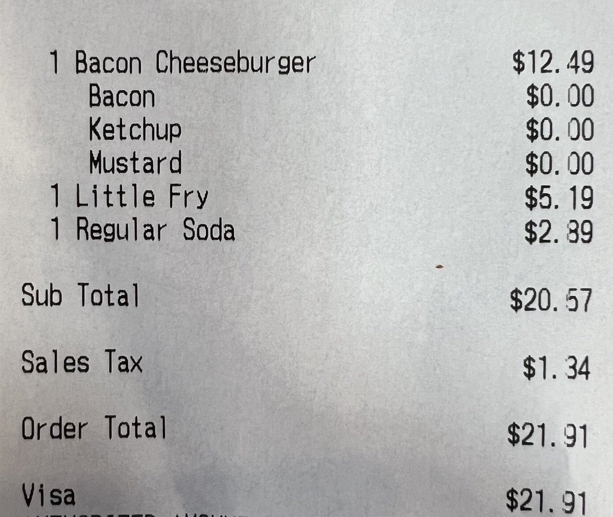 WallStreetMav's tweet photo. Five Guys is crazy expensive.

Why is a small order of fries $5.19? https://t.co/lN2UIn3T7e