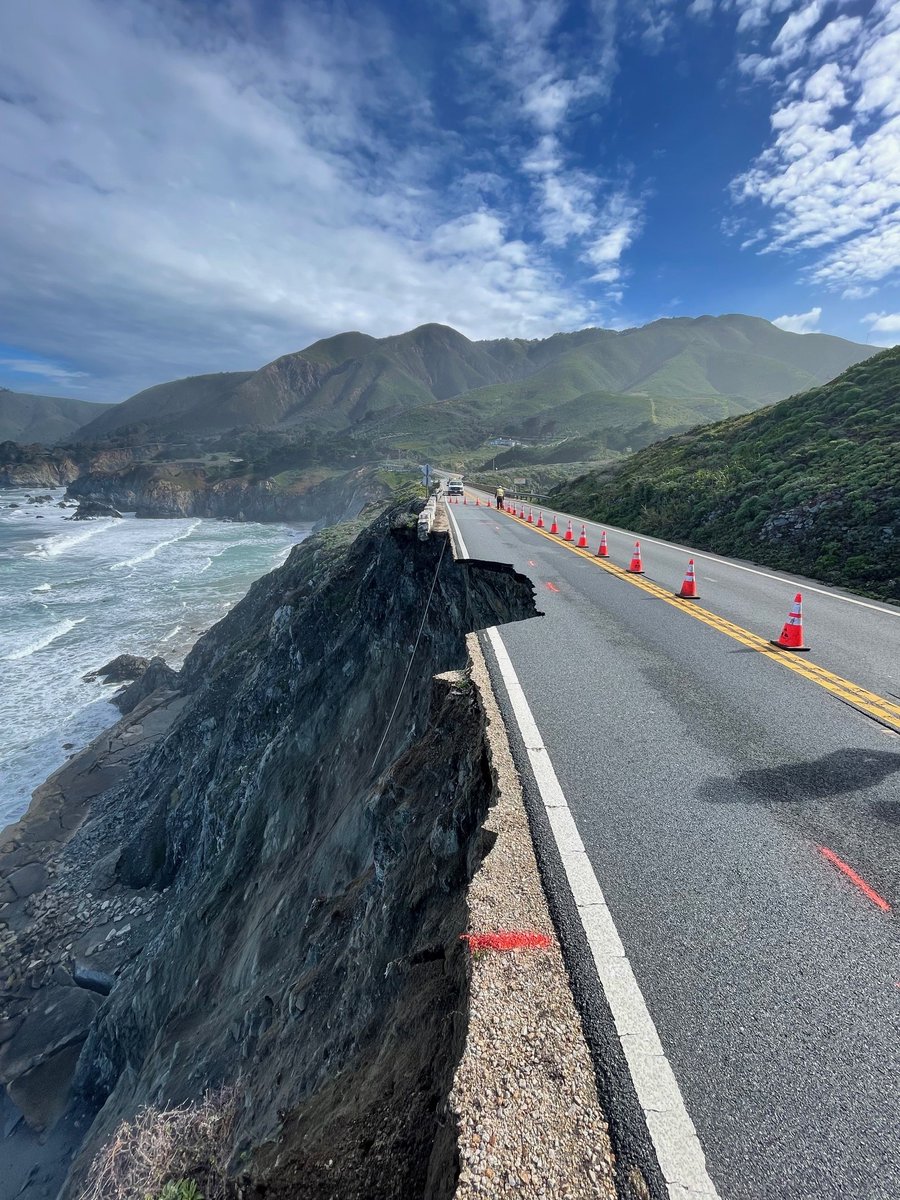 #Hwy1 remains closed on the #BigSur Coast due to a slip out of the road just south of the Rocky Creek Bridge. Convoys will lead essential travelers through closure area daily at 8 am and 4 pm. Engineers on site to observe conditions. Crews working to stabilize edge of roadway.