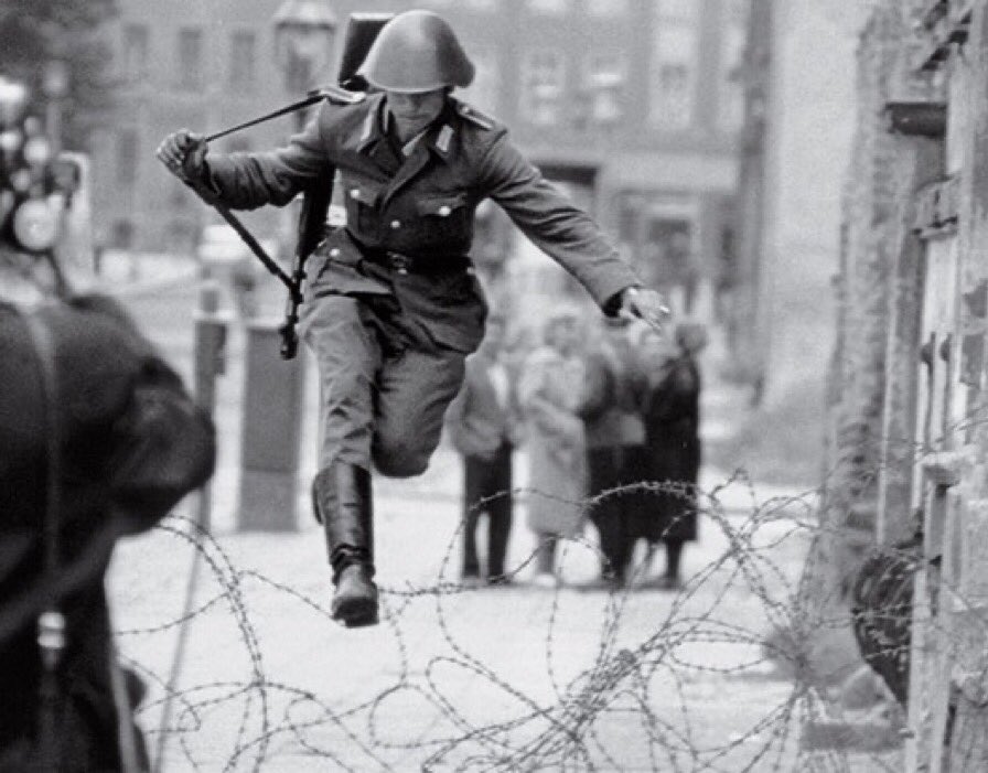 @fasc1nate August 15th, 1961 The 19-year-old East German border guard Konrad Schumann is tasked with patrolling the construction site of the Berlin Wall. He realizes that this could be his last chance to escape communism and jumps to freedom in Western Berlin People always flee communism