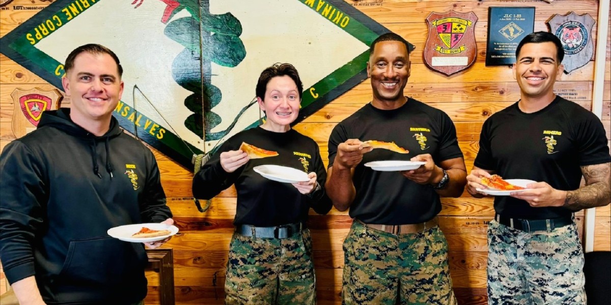 USOPacific's tweet photo. USO Schwab brought pizza to the Marines training at Jungle Warfare Training Center at Camp Gonsalves. A little bit of love goes a long way in the jungle. #forthepeoplewhoserve https://t.co/hbfFHNv3se