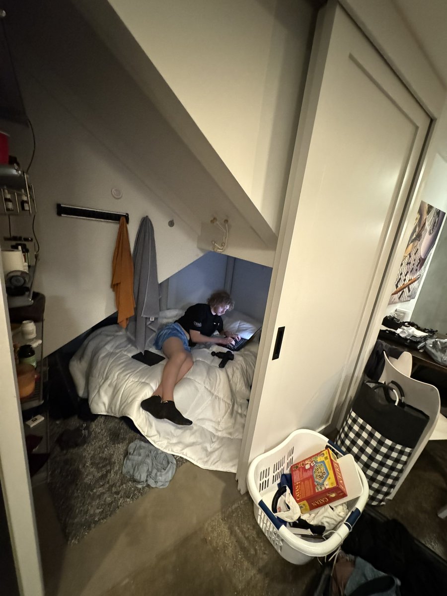 living under the stairs in New York costs $1,800 per month photo: @czoob3 from @WhopIO’s bedroom