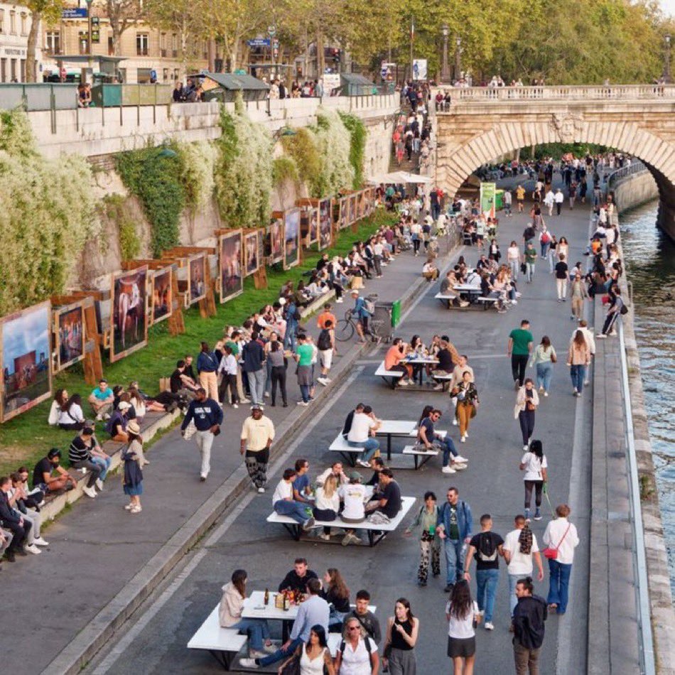 The bank of the Seine in Paris. This used to be surrendered space for cars. For several years now it’s been a special place for people. All it took was leadership. Including fighting and winning a court battle when that leadership was challenged. HT <a href="/EmmanuelSPV/">Emmanuel</a> for the great pic
