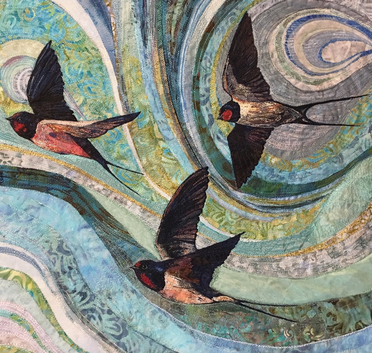 'A swoop of swallows' by UK textile artist Rachel Wright, machine embroidered on calico with various fabrics #WomensArt