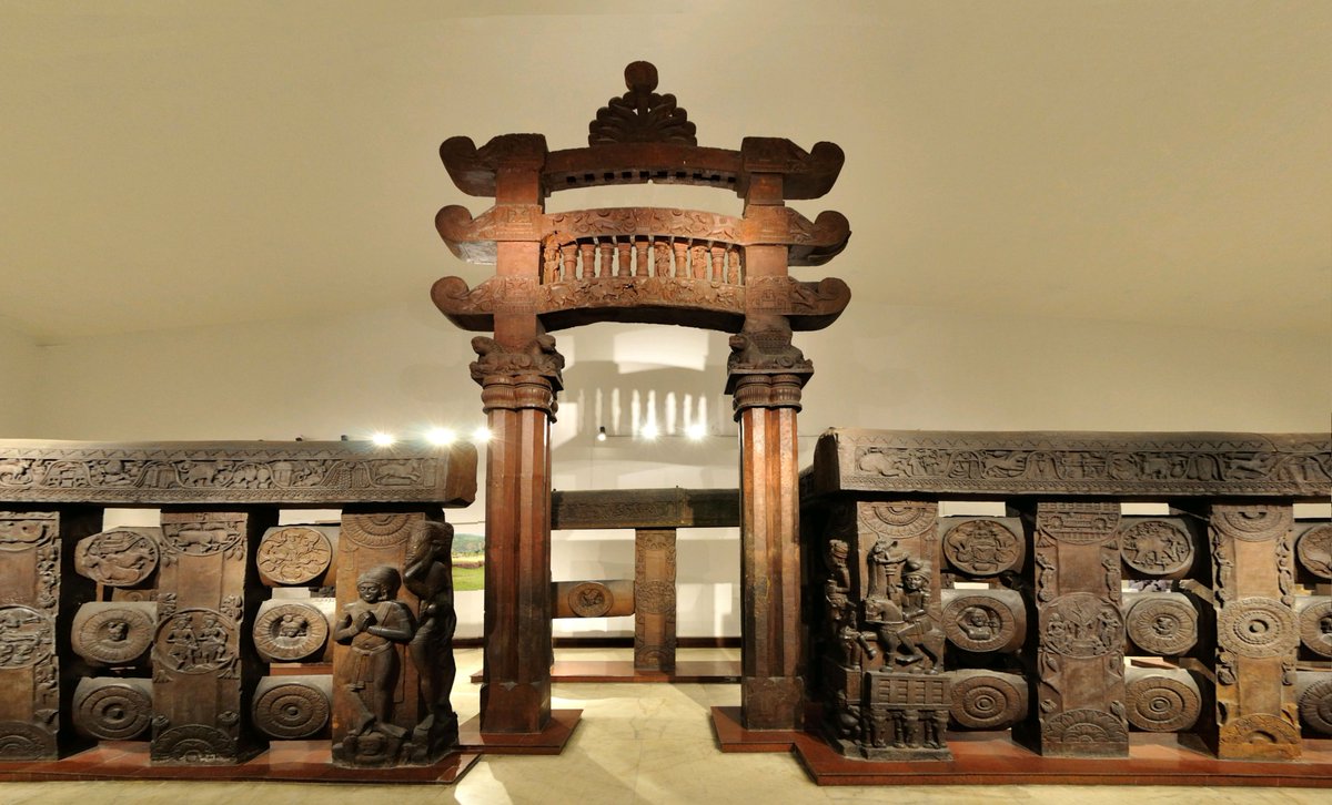East gateway and railings of Bharhut Stupa red sandstone Sculptured railings: 115 BCE toranas: 75 BCE. Indian Museum, Kolkata