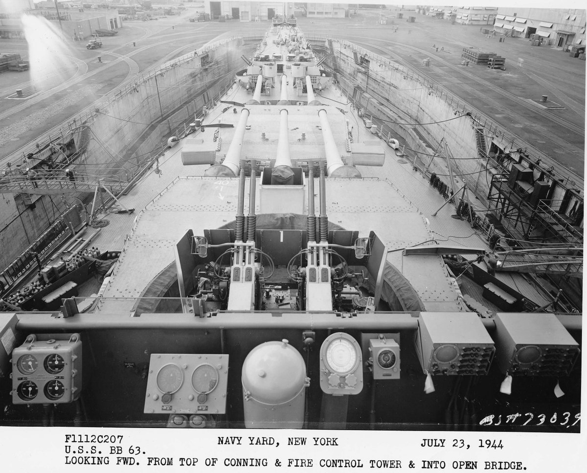 USS Missouri (BB 63) looking towards the bow from the top of the conning tower and fire control tower. Caption says New York Navy Yard, which is true, but it's the dry dock in Bayonne, NJ - technically an Annex of NYNY at the time - July 23 1944 #BB63 #USSMissouri