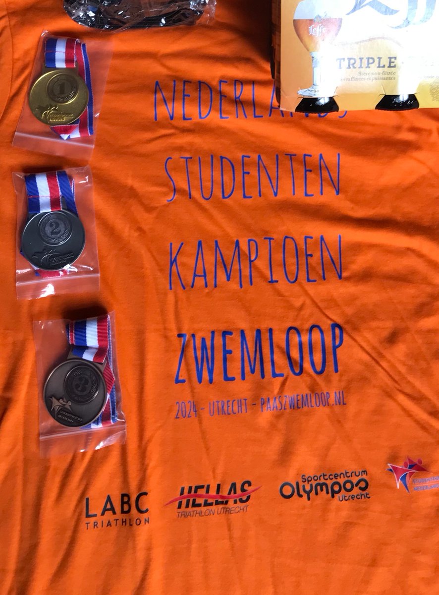 1e NSK titels Zwemloop ooit, gingen gister tijdens Utrechtse <a href="/paaszwemloop/">Paaszwemloop</a> naar Darren van Maanen <a href="/TilburgU/">Tilburg University</a> &amp; Myra Smulders (Haagse Hogeschool)! Topstrijd om oranje shirt ging tussen NL multi-sport specialisten die verder uit Amsterdam, Delft, Enschede, Leiden en #Utrecht kwamen.